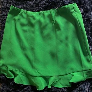 American threads new with tags miniskirt in green. Never worn.